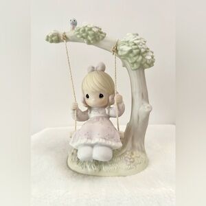Charming Precious Moment Figurine of Girl on Swing